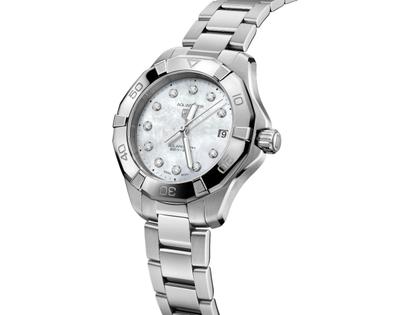 TAG Heuer Aquaracer Professional 200 Solargraph Quarz Edelstahl 34mm weißes Perlmutt-Zifferblatt mit Brillanten Metallband – Damenuhren Uhr mit Datum aus Edelstahl. Das Gehäuse ist rund und silber. Das Edelstahlarmband ist silber. Das Zifferblatt ist ein Index in weiß. – Ansicht 2