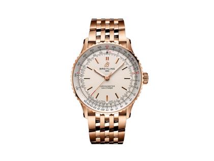 Breitling Navitimer Automatic 41 Chronometer Rotgold cremefarbenes Zifferblatt Rotgoldband – Herrenuhren Uhr ohne Datum aus 750 Rotgold. Das Gehäuse ist rund und rotgold. Das Goldarmband ist rotgold. Das Zifferblatt ist ein Index in beige.