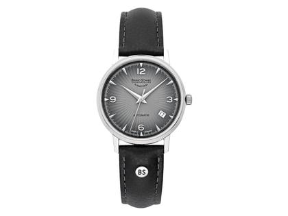 Bruno Söhnle Glashütte Stuttgart II Small Automatik Edelstahl graues Zifferblatt schwarzes Lederband – Damenuhren Uhr mit Datum aus Edelstahl. Das Gehäuse ist rund und silber. Das Lederarmband ist schwarz. Das Zifferblatt ist arabisch Index und grau.