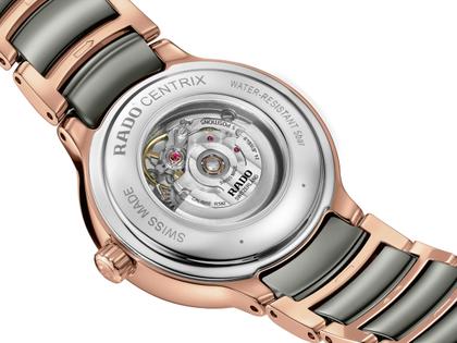 Rado Centrix Diamonds Automatik Edelstahl Roségold-PVD 30,5mm weißes Zifferblatt mit Brillanten Metallband – Damenuhren Uhr mit Datum aus Edelstahl, Keramik und PVD beschichtet. Das Gehäuse ist rund und roségold. Das Keramikarmband ist grau. Das Zifferblatt ist ein Index in weiß. – Ansicht 4