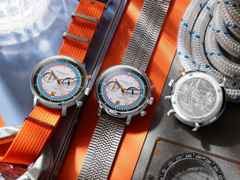 Sternglas Hamburg Edition Hafen Quarz Edelstahl 42mm mehrfarbiges Zifferblatt orangefarbenes Textilband – Herrenuhren Uhr mit Datum aus Edelstahl und Leder. Das Gehäuse ist rund und silber. Das Textilarmband ist orange. Das Zifferblatt ist arabisch Index und mehrfarbig. – Ansicht 4