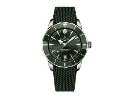 Herrenuhren Uhr mit Datum aus Edelstahl, Kautschuk und Keramik. Das Gehäuse ist rund und silber. Das Kautschuk / Kunststoff / Silikon Armband ist grün. Das Zifferblatt ist ein Index in grün.