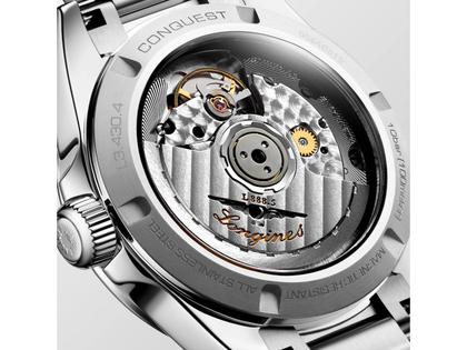Longines Conquest Automatik Edelstahl 34mm grünes Zifferblatt Metallband – Damenuhren Uhr mit Datum aus Edelstahl. Das Gehäuse ist rund und silber. Das Edelstahlarmband ist silber. Das Zifferblatt ist ein Index in grün. – Ansicht 5