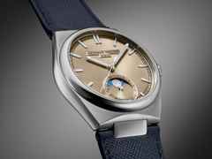 Frederique Constant Highlife Moonphase Date Manufacture Automatik Edelstahl 39mm beiges Zifferblatt Metallband und blaues Lederband – Herrenuhren Uhr mit Datum aus Edelstahl und Leder. Das Gehäuse ist rund und silber. Das Edelstahlarmband ist silber. Das Zifferblatt ist ein Index in beige. – Ansicht 9