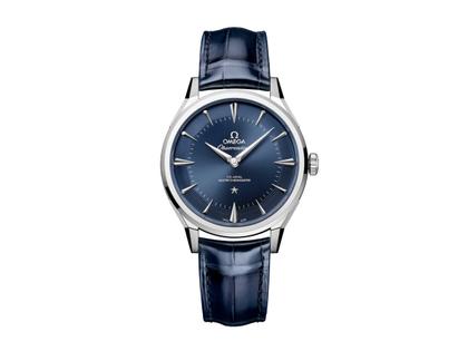Herrenuhren Uhr ohne Datum aus 750 Weißgold, Edelstahl und Leder. Das Gehäuse ist rund und silber. Das Lederarmband Kroko / Alligator ist blau. Das Zifferblatt ist ein Index in blau.