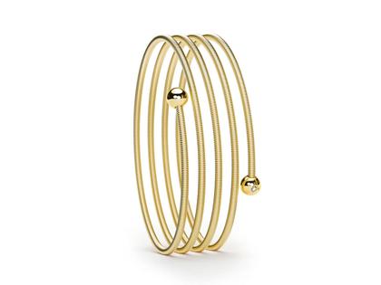 Niessing Colette C Embrace Armreif 4-fach Classic Yellow mit Besatz – Armschmuck Armreif aus 750 Gelbgold.
