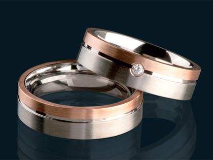 Ernstes Design Paar Nr. 1 – Ringe Ring mit Besatz aus 750 Rotgold.