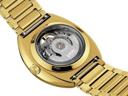 Rado DiaStar Original Skeleton Automatik Edelstahl Gelbgold-PVD 38mm skelettiertes Zifferblatt Metallband – Damenuhren Uhr ohne Datum aus Edelstahl und PVD beschichtet. Das Gehäuse ist oval und gelbgold. Das Edelstahlarmband ist gelbgold. Das Zifferblatt ist ein Index in grau. – Ansicht 4