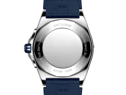 Breitling Super Chronomat Automatic 38 Edelstahl blaues Zifferblatt blaues Kautschukband – Damenuhren Uhr mit Datum aus Edelstahl, Kautschuk und Keramik. Das Gehäuse ist rund und silber. Das Kautschuk / Kunststoff / Silikon Armband ist blau. Das Zifferblatt ist ein Index in blau. – Ansicht 4