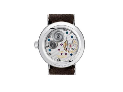 Nomos Glashütte Tangente 33 Karat Handaufzug Edelstahl 33mm vergoldetes Zifferblatt braunes Lederband Glasboden – Damenuhren Uhr ohne Datum aus Edelstahl und Leder. Das Gehäuse ist rund und silber. Das Lederarmband ist braun. Das Zifferblatt ist arabisch Index und gelbgold. – Ansicht 2