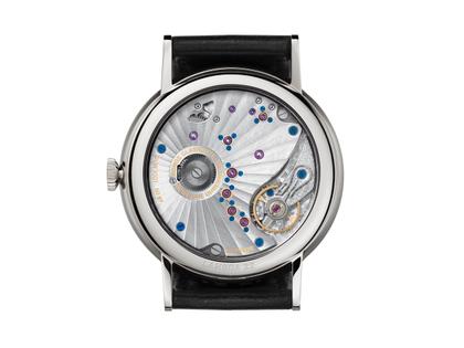 Nomos Glashütte Lambda 42 Handaufzug Weißgold 42mm weißes Zifferblatt schwarzes Lederband – Herrenuhren Uhr ohne Datum aus 750 Weißgold und Leder. Das Gehäuse ist rund und silber. Das Lederarmband ist schwarz. Das Zifferblatt ist ein Index in weiß. – Ansicht 3