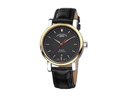 Mühle Glashütte Teutonia IV 30 Jahre Deutsche Einheit Limited Edition Automatik Edelstahl bicolor 41mm schwarzes Zifferblatt schwarzes Lederband – Herrenuhren Uhr mit Datum aus 750 Gelbgold und Edelstahl. Das Gehäuse ist rund und silber-gelbgold. Das Lederarmband Kroko / Alligator ist schwarz. Das Zifferblatt ist ein Index in schwarz.