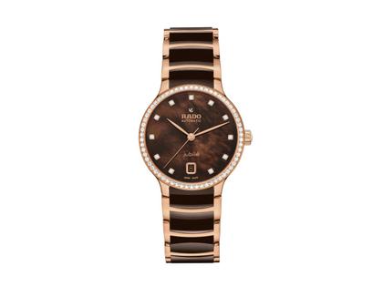 Damenuhren Uhr mit Datum aus Edelstahl, Keramik und PVD beschichtet. Das Gehäuse ist rund und roségold. Das Edelstahlarmband ist roségold. Das Zifferblatt ist ein Index in weiß.