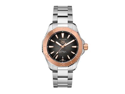 TAG Heuer Aquaracer Professional 200 Date Automatik Edelstahl 40mm schwarzes Zifferblatt Metallband – Herrenuhren Uhr mit Datum aus 750 Gelbgold und Edelstahl. Das Gehäuse ist rund und silber. Das Edelstahlarmband ist silber. Das Zifferblatt ist ein Index in schwarz.