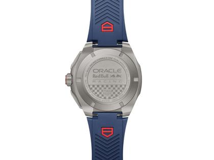 TAG Heuer Formula 1 Chronograph X Oracle RedBull Racing Automatik Titan 44mm blaues Zifferblatt blaues Kautschukband – Herrenuhren Chronograph aus Carbon, DLC beschichtet, Kautschuk und Titan. Das Gehäuse ist rund und grau. Das Kautschuk / Kunststoff / Silikon Armband ist blau. Das Zifferblatt ist ein Index in blau. – Ansicht 3