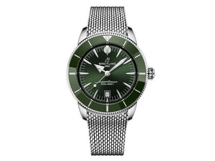Breitling Superocean Heritage B31 Automatik Edelstahl 44mm grünes Zifferblatt Metallband – Herrenuhren Uhr mit Datum aus Edelstahl und Keramik. Das Gehäuse ist rund und silber. Das Edelstahlarmband ist silber. Das Zifferblatt ist ein Index in grün.