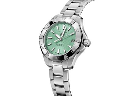 TAG Heuer Aquaracer Professional 200 Solargraph Quarz Edelstahl 34mm türkises Zifferblatt Metallband – Damenuhren Uhr mit Datum aus Edelstahl. Das Gehäuse ist rund und silber. Das Edelstahlarmband ist silber. Das Zifferblatt ist ein Index in türkis. – Ansicht 2