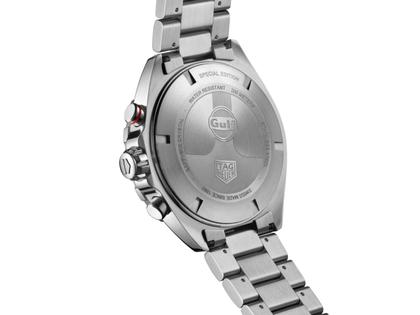 TAG Heuer Formula 1 Chronograph X Gulf Quarz Edelstahl 43mm blaues Zifferblatt Metallband – Herrenuhren Chronograph aus Aluminium und Edelstahl. Das Gehäuse ist rund und silber. Das Edelstahlarmband ist silber. Das Zifferblatt ist arabisch Index und blau. – Ansicht 3
