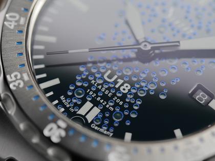 Sinn Spezialuhren U18 Taucheruhr Limited Edition Automatik Edelstahl 44mm blau-grünes Zifferblatt Metallband – Herrenuhren Uhr mit Datum aus Edelstahl. Das Gehäuse ist rund und grau. Das Edelstahlarmband ist grau. Das Zifferblatt ist ein Index in blau. – Ansicht 6