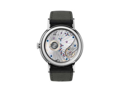 Nomos Glashütte Lambda 42 Handaufzug Weißgold 42mm weißes Zifferblatt schwarzes Lederband – Herrenuhren Uhr ohne Datum aus 750 Weißgold und Leder. Das Gehäuse ist rund und silber. Das Lederarmband ist schwarz. Das Zifferblatt ist ein Index in weiß. – Ansicht 2