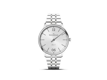 MeisterSinger Yaara Quarz Edelstahl 36mm silbernes Zifferblatt Metallband – Damenuhren Uhr ohne Datum aus Edelstahl. Das Gehäuse ist rund und silber. Das Edelstahlarmband ist silber. Das Zifferblatt ist arabisch Index und silber.
