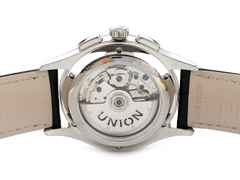 Union Glashütte Noramis Chronograph Sachsen Classic   2013 Limited Edition Automatik D005.427.16.037.07 Full Set mit Garantie Occasion Refurbished – Herrenuhren Uhr mit Datum aus Edelstahl. Das Gehäuse ist rund und silber. Das Lederarmband ist schwarz. Das Zifferblatt ist arabisch Index und silber. – Ansicht 2