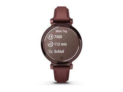Garmin Lily 2 Smartwatch Aluminium eloxiert 35mm dunkelbronzefarbenes Display bordeauxfarbenes Lederband – Damenuhren Uhr Multifunktion aus eloxiertes Aluminium, Kunststoff und Leder. Das Gehäuse ist rund und rot. Das Lederarmband ist rot. Das Zifferblatt ist digital und rot. – Ansicht 2