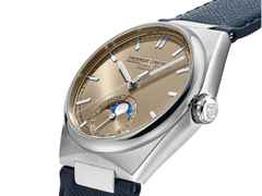 Frederique Constant Highlife Moonphase Date Manufacture Automatik Edelstahl 39mm beiges Zifferblatt Metallband und blaues Lederband – Herrenuhren Uhr mit Datum aus Edelstahl und Leder. Das Gehäuse ist rund und silber. Das Edelstahlarmband ist silber. Das Zifferblatt ist ein Index in beige. – Ansicht 5