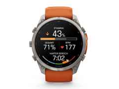 Garmin Fenix 9 Pro inReach Titan 51mm digitales Display orangefarbenes Silikonband – Herrenuhren Uhr Multifunktion aus Kautschuk und Titan. Das Gehäuse ist rund und grau. Das Kautschuk / Kunststoff / Silikon Armband ist orange. Das Zifferblatt ist digital und schwarz.