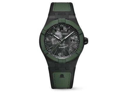 Maurice Lacroix AIKON-IC Frozen Carbon Automatik Titan Schwarz-DLC 43mm Carbon-Zifferblatt schwarzes Kautschukband limitiert – Herrenuhren Uhr mit Datum aus Carbon, DLC beschichtet, Edelstahl, Kautschuk, Keramik, Leder und Titan. Das Gehäuse ist rund und schwarz. Das Kautschuk / Kunststoff / Silikon Armband ist schwarz. Das Zifferblatt ist ein Index in schwarz.