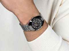 Rado DiaStar Original Skeleton Automatik Edelstahl 38mm skelettiertes Zifferblatt Metallband – Herrenuhren Uhr ohne Datum aus Edelstahl und Keramik. Das Gehäuse ist oval und silber. Das Edelstahlarmband ist silber. Das Zifferblatt ist ein Index in grau. – Ansicht 6