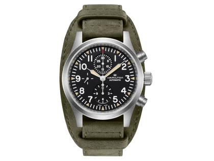 Herrenuhren Chronograph aus Edelstahl. Das Gehäuse ist rund und silber. Das Lederarmband ist grün. Das Zifferblatt ist arabisch und schwarz.