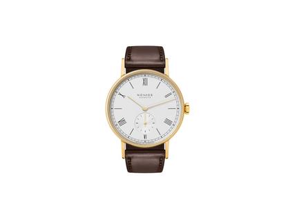 Nomos Glashütte Ludwig Gold Doré Handaufzug Gelbgold 35mm weißes Zifferblatt braunes Lederband – Damenuhren Uhr ohne Datum aus 750 Gelbgold und Leder. Das Gehäuse ist rund und gelbgold. Das Lederarmband ist braun. Das Zifferblatt ist römisch Index und weiß.