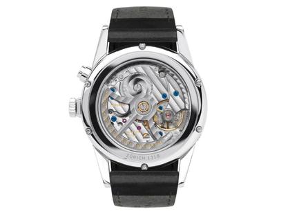 Nomos Glashütte Zürich Weltzeit Nachtblau Automatik Edelstahl 40mm weißes Zifferblatt schwarzes Lederband – Herrenuhren Uhr ohne Datum aus Edelstahl und Leder. Das Gehäuse ist rund und silber. Das Lederarmband ist schwarz. Das Zifferblatt ist ein Index in blau. – Ansicht 4