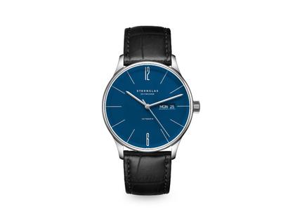 Sternglas Berlin Automatik Edelstahl 38mm blaues Zifferblatt schwarzes Lederband – Herrenuhren Uhr mit Datum aus Edelstahl und Leder. Das Gehäuse ist rund und silber. Das Lederarmband ist schwarz. Das Zifferblatt ist ein Index in blau.