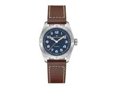 Hamilton Khaki Field Expedition Automatik Edelstahl 37mm dunkelblaues Zifferblatt braunes Lederband – Herrenuhren Uhr ohne Datum aus Edelstahl und Leder. Das Gehäuse ist rund und silber. Das Edelstahlarmband ist braun. Das Zifferblatt ist arabisch und blau.