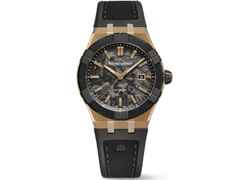 Maurice Lacroix AIKON-IC Frozen Carbon Automatik Bronze 43mm Carbon-Zifferblatt schwarzes Kautschukband limitiert – Herrenuhren Uhr mit Datum aus Bronze, Carbon, Edelstahl, Kautschuk, Keramik und Leder. Das Gehäuse ist rund und bronze. Das Kautschuk / Kunststoff / Silikon Armband ist schwarz. Das Zifferblatt ist ein Index in schwarz.