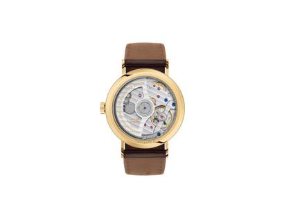 Nomos Glashütte Tangente Gold Neomatik Doré Automatik Gelbgold 35mm weißes Zifferblatt braunes Lederband – Damenuhren Uhr ohne Datum aus 750 Gelbgold und Leder. Das Gehäuse ist rund und gelbgold. Das Lederarmband ist braun. Das Zifferblatt ist arabisch Index und weiß. – Ansicht 2