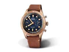 Oris Carl Brashear Chronograph Limited Edition – Herrenuhren Chronograph aus Bronze. Das Gehäuse ist rund und roségold. Das Lederarmband ist braun. Das Zifferblatt ist ein Index in blau.