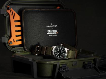 Hamilton Khaki Field Call of Duty Automatik Edelstahl 38mm schwarzes Zifferblatt olivgrünes Textilband Limited Edition – Herrenuhren Uhr mit Datum aus Edelstahl und Leder. Das Gehäuse ist rund und silber. Das Textilarmband ist grün. Das Zifferblatt ist arabisch und schwarz. – Ansicht 6