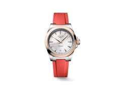 Longines Conquest Automatik Edelstahl 34mm silberfarbenes Zifferblatt orangefarbenes Kautschukband – Damenuhren Uhr mit Datum aus 750 Rotgold, Edelstahl und Kautschuk. Das Gehäuse ist rund und silber. Das Kautschuk / Kunststoff / Silikon Armband ist orange. Das Zifferblatt ist ein Index in silber.