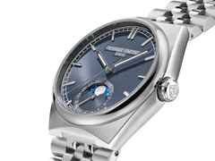 Frederique Constant Highlife Moonphase Date Manufacture Automatik Edelstahl 39mm blaues Zifferblatt Metallband und blaues Lederband – Herrenuhren Uhr mit Datum aus Edelstahl und Leder. Das Gehäuse ist rund und silber. Das Edelstahlarmband ist silber. Das Zifferblatt ist ein Index in blau. – Ansicht 2