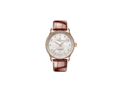 Breitling Navitimer 32 Quarz Rotgold weißes Perlmutt-Zifferblatt braunes Lederband – Damenuhren Uhr ohne Datum aus 750 Rotgold und Leder. Das Gehäuse ist rund und roségold. Das Lederarmband Kroko / Alligator ist roségold. Das Zifferblatt ist arabisch Index und weiß.