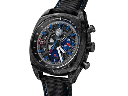 TAG Heuer Monza Flyback Chronometer Automatik Carbon 42mm skelettiertes Zifferblatt schwarzes Textilband – Herrenuhren Chronograph aus DLC beschichtet, Edelstahl, Carbon und Leder. Das Gehäuse ist quadratisch und schwarz. Das Lederarmband ist schwarz. Das Zifferblatt ist ein Index in grau. – Ansicht 2