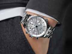 Sinn Spezialuhren 6000 Frankfurter Finanzplatzuhr Automatik Edelstahl 38,5mm silberfarbenes Zifferblatt Metallband limitiert – Herrenuhren Chronograph aus Edelstahl. Das Gehäuse ist rund und silber. Das Edelstahlarmband ist silber. Das Zifferblatt ist ein Index in silber. – Ansicht 6