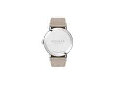 Nomos Glashütte Tangente 33 Champagner Handaufzug Edelstahl 33mm beiges Zifferblatt beiges Lederband Stahlboden – Damenuhren Uhr ohne Datum aus Edelstahl. Das Gehäuse ist rund und silber. Das Lederarmband ist beige. Das Zifferblatt ist arabisch Index und beige. – Ansicht 2