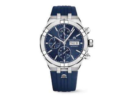Maurice Lacroix Aikon Chronograph Automatik Edelstahl 44mm blaues Zifferblatt blaues Kautschukband – Herrenuhren Chronograph aus Edelstahl und Kautschuk. Das Gehäuse ist rund und silber. Das Kautschuk / Kunststoff / Silikon Armband ist blau. Das Zifferblatt ist ein Index in blau.