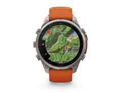 Garmin Fenix 9 Pro inReach Titan 47mm digitales Display orangefarbenes Silikonband – Herrenuhren Uhr Multifunktion aus Kautschuk und Titan. Das Gehäuse ist rund und grau. Das Kautschuk / Kunststoff / Silikon Armband ist orange. Das Zifferblatt ist digital und schwarz.