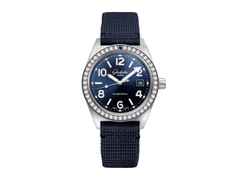 Glashütte Original SeaQ Automatik Edelstahl 40mm blaues Zifferblatt mit Brillanten blaues Textilband – Damenuhren Uhr mit Datum aus Edelstahl und Keramik. Das Gehäuse ist rund und silber. Das Textilarmband ist blau. Das Zifferblatt ist arabisch Index und blau.