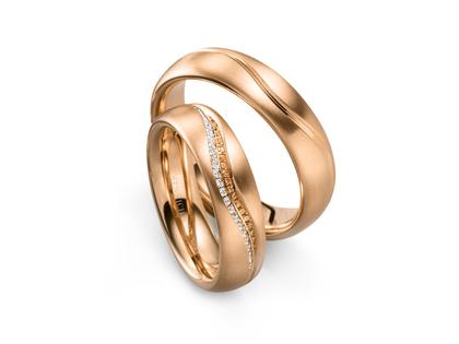 Henrich & Denzel Reflex Trauringpaar Roségold gewölbt mit Brillanten 0,090ct – Ringe Trauring mit Besatz in roségold und aus 750 Rotgold.